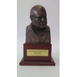 Sir Winston Churchill 1874-1965 Bronze Bust by Oscar Nemon on a wooden base, 23 cm