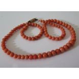 A Graduated Coral Bead Necklace, largest bead c. 7 mm, 42 cm long, 17.7 g