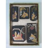 A Chinese Cased Set of Calligraphy Inks decorated with figures and characters