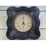 A Nineteenth Century Wall Clock, the ebonised case with brass inlay and enamel Roman numerals, 60