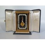 A Jaeger LeCoultre Eight Day In-line Skeleton Desk Clock in original numbered fitted box, base