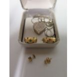 A Pair of 14 K Gold Earrings 1.2g, silver heart locket and other jewellery