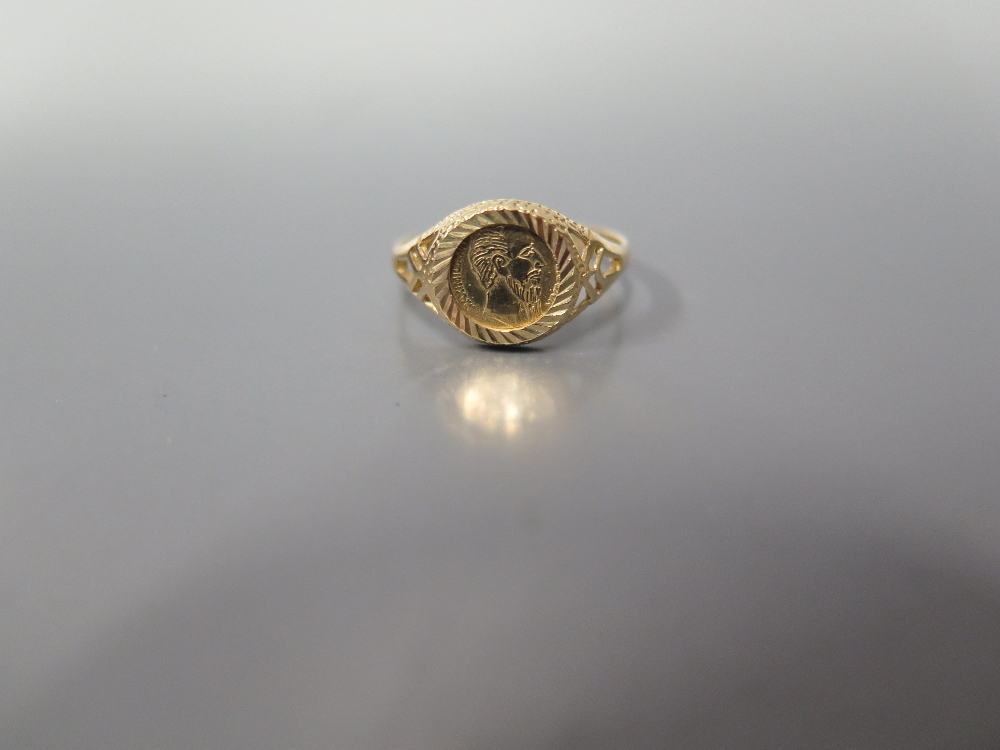 A 9ct Gold Child's Ring with Mexican Coin, 1.4 g, size K.5