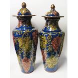 A Pair of Wendy Mason 1995 Lustre Vases with covers decorated with vine and grapes, 61 cm