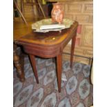 A Nineteenth Century Mahogany and Crossbanded Card Table