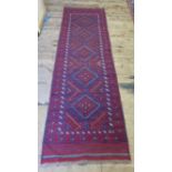 A Persian Rug, 240 x 66 cm