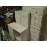 An Alstons Compactum, matching dressing table and pair of bedside chests