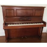Steinway (c1924) A Model K upright piano in a mahogany case.