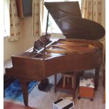 Blüthner (c1934) A 5ft 1in grand piano in a walnut case on square tapered legs;