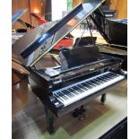 Yamaha (c1981) A 6ft 1in Model C3 grand piano in a bright ebonised case on square tapered legs.