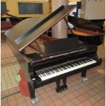 Steinway (c1981) A 9ft Model D grand piano in a satin ebonised case on square tapered legs.