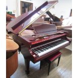 Samick (c2005) A 4ft 6in modern grand piano in a bright mahogany case on square tapered legs;