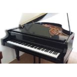 Kimball (c1973) A 5ft 8in grand piano in a bright ebonised case. AMENDMENT to estimate.
