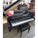 Kawai (c2008) A 5ft Model GM10 grand piano in a bright ebonised case on square tapered legs;