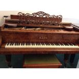 Kaps (c1888) A 6ft grand piano in a figured walnut case, on turned octagonal legs.