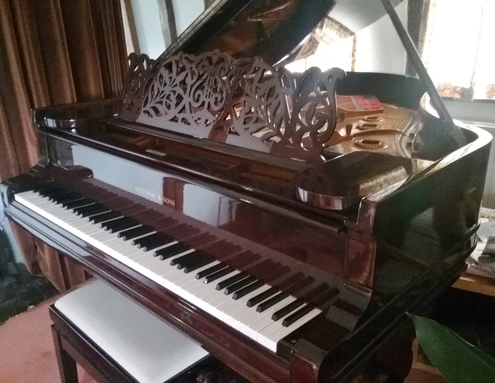 Steinway (c1890) A 6ft old style Model A grand piano in a rosewood case on turned legs;