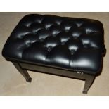 Piano Stool A concert adjustable piano stool in a bright ebonised finish with button leather top.