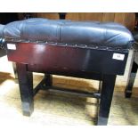 Piano Stool A concert adjustable stool in a bright ebonised finish with button leather top.