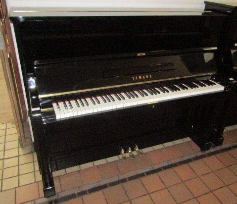 Yamaha A 121cm Model U1 upright piano in an ebonised case