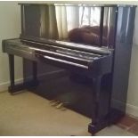 Yamaha (c1982) A Model U1 upright piano in a bright ebonised case. AMENDMENT Is a Model YUS.