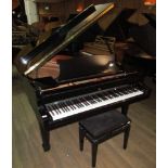 Steinway (c2011) A 5ft 10in Model O grand piano in a bright ebonised case on square tapered legs;