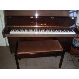 Yamaha (c1993) A Model C108 upright piano in a bright mahogany case;