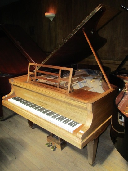 Blüthner (c1901) A 6ft 3in grand piano in a rosewood case on turned and fluted legs.