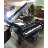 Yamaha (c1973) A 6ft 1in Model C3 grand piano in a bright ebonised case on square tapered legs.