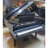 Yamaha (c1979) A 6ft 1in Model C3 grand piano in a bright ebonised case on square tapered legs.