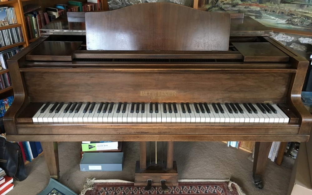 Blüthner (c1930’s) A 5ft 1in grand piano in a mahogany case on square tapered legs;