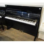 Hoffmann (c2001) A Model T120 upright piano in a bright ebonised case.