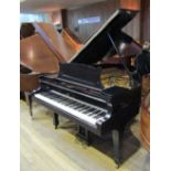 Steinway (c1937) A 5ft 10in Model O grand piano in an ebonised case on square tapered legs.