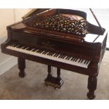 Steinway (c1887) A 6ft 11in Model B grand piano in a rosewood case on 'elephant' legs.