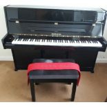 Rieger Kloss (c1998) A Model 109 Attractive modern style upright piano in a bright ebonised case;