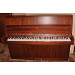 Fazer (c1983) An upright piano in a mahogany case.