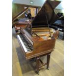 Broadwood (c1912) A 5ft 8in barless grand piano in a rosewood case on dual square tapered legs.