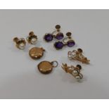 A quantity of gold jewellery, comprised of a small round locket,