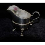 A George V silver helmet shaped cream jug, Sheffield 1915, 3.46ozt, 107.7g, 8.