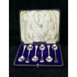 A set of six George V silver trefid and rat tail pattern coffee spoons, Sheffield 1915,