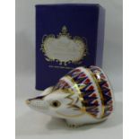 A Royal Crown Derby hedgehog paperweight, with gold stopper, 5.