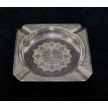 A Russian silver coloured metal square section ash tray, 84 zolotnik mark,