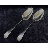 A pair of George III silver old English pattern table spoons, London 1787 by Hester Bateman,