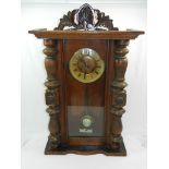 A walnut cased Vienna style eight day wall clock,