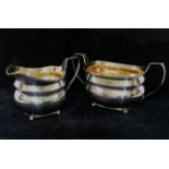 A George III silver milk jug and sugar bowl, London 1808 by Robert and Samuel Hennell,