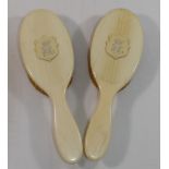 A pair of ivory backed hair brushes, once the property of Queen Victoria,