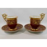 A pair of early 20th century Dresden coffee cups and saucers,