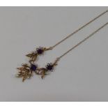 A yellow metal amethyst and cultured pearl floral necklace, stamped '9CT', on fine chain, 45cm long,