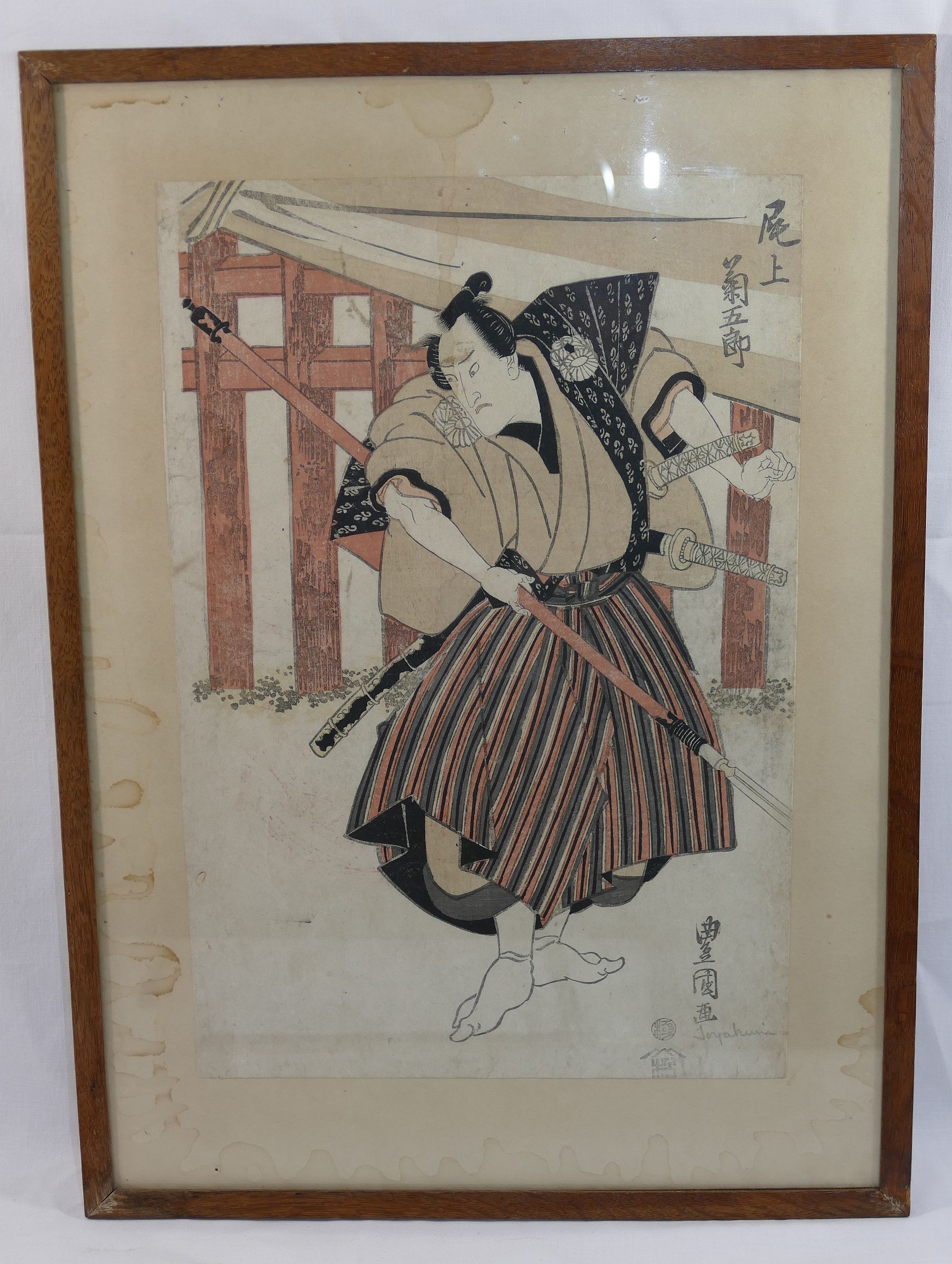 Four 19th century Japanese polychrome woodblock prints depicting actors, all framed and glazed,