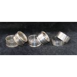 Three pairs of silver napkin rings, Birmingham 1921, Birmingham 1932 and Birmingham 1969,