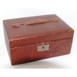 A brown Morocco leather bound jewellery box, with fitted tray, 20.25cm wide x 9.